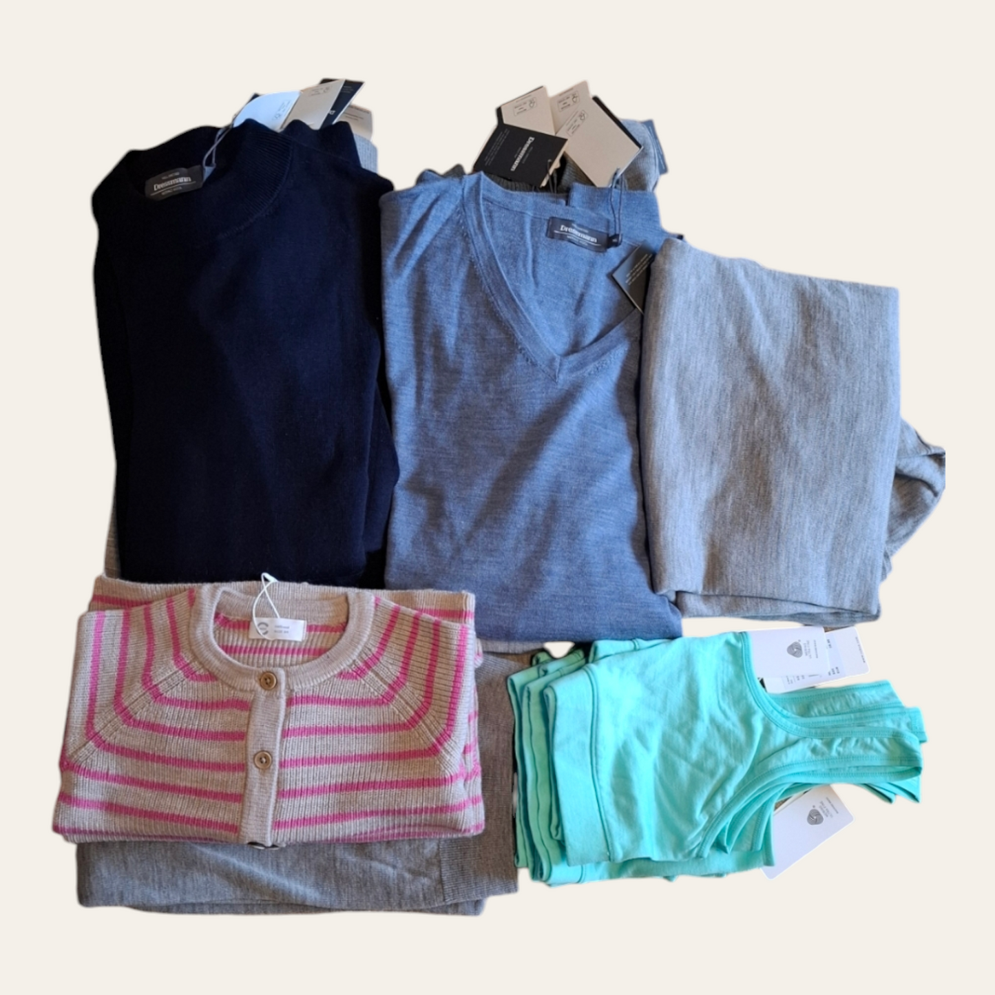 Merino wool clothing reservation package in assorted colors and sizes.